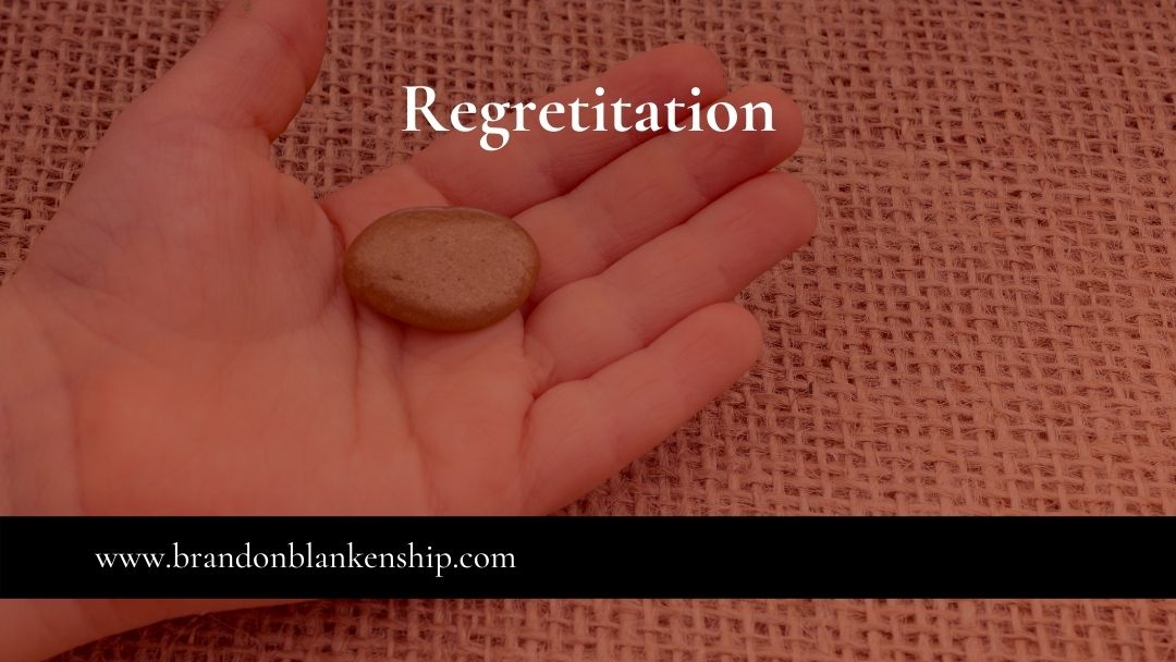 Stone in palm as a regretitation